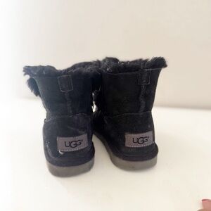 Bow kids. UGG Black Suede Boots